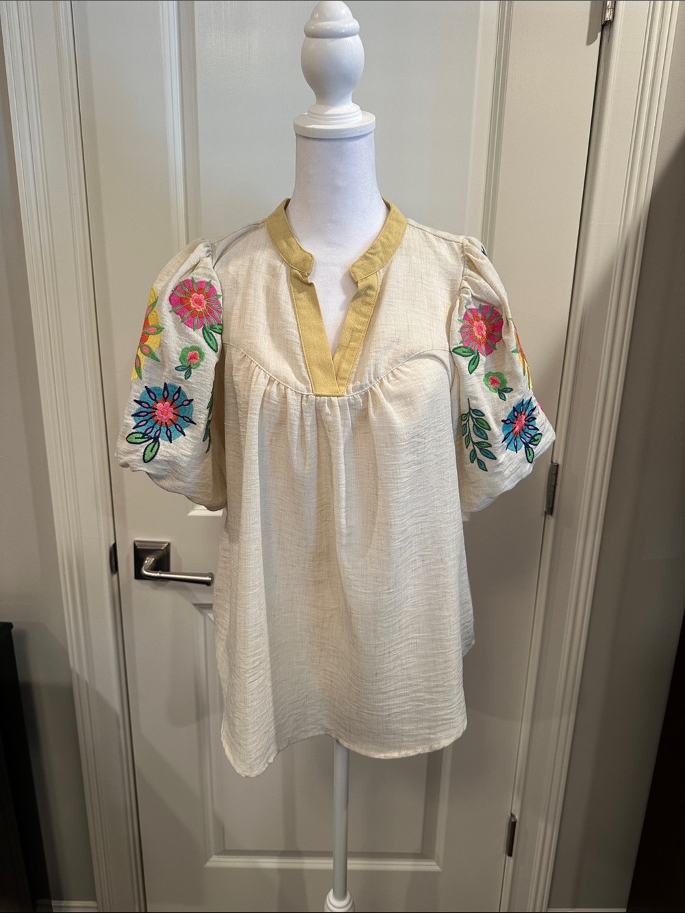 Umgee Cream Tunic with Yellow Trim and Multicolor Floral Embroidery
